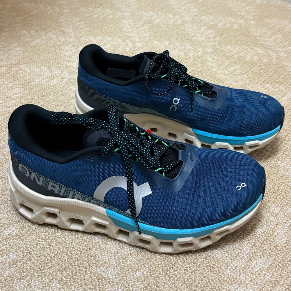 On Running Cloudmonster Navy and White Athletic Shoes